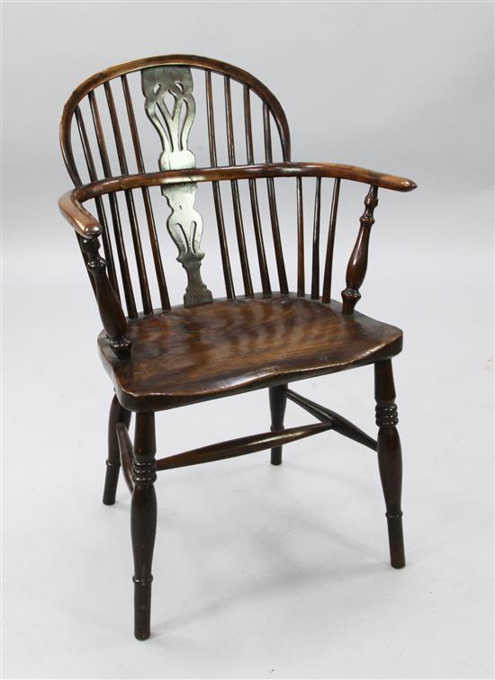 An early 19th century yew, elm and ash Windsor chair, H.2ft 10in.